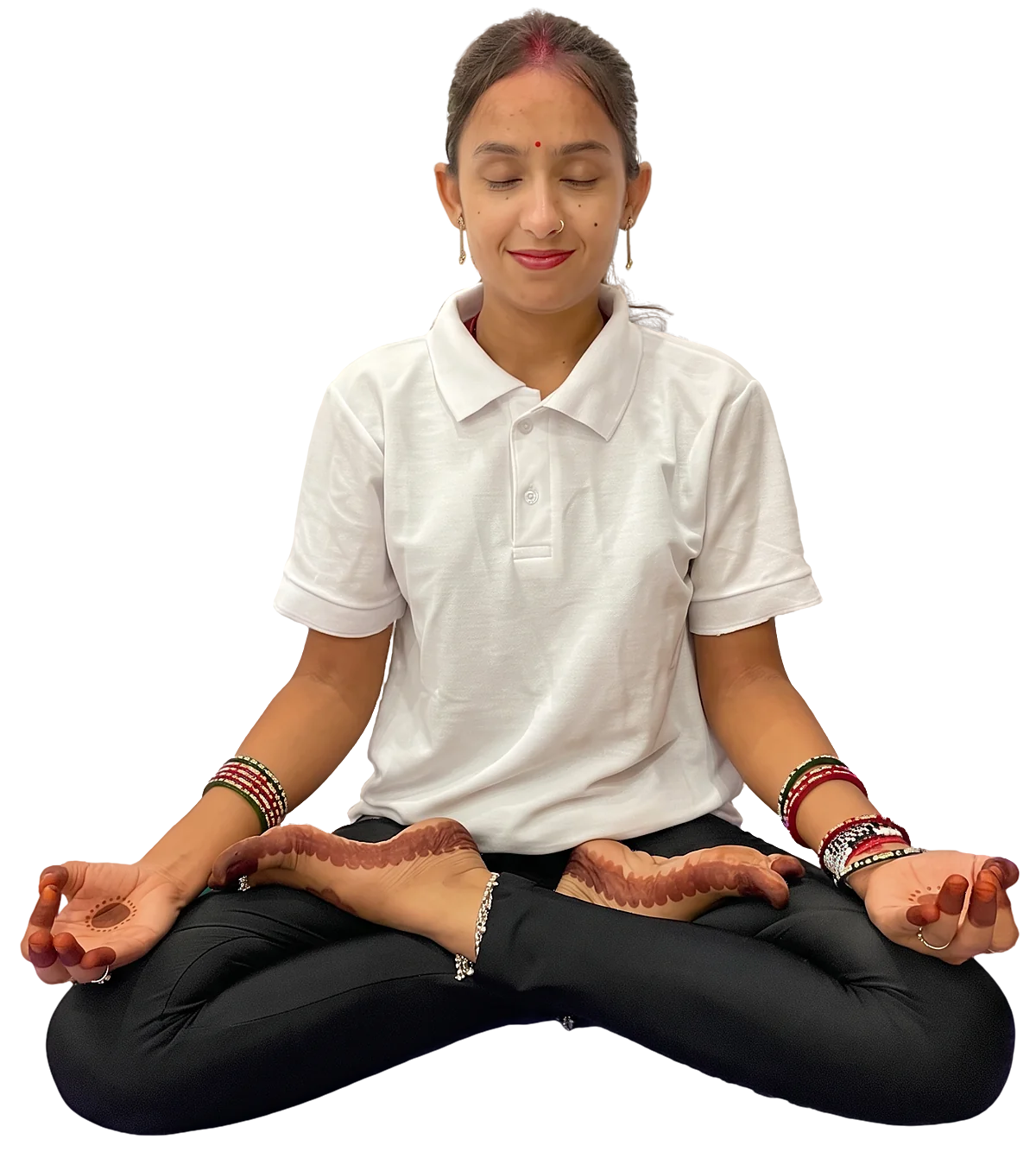 Latika meditating cross-legged